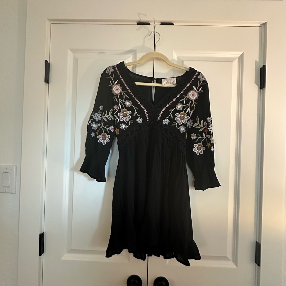 Francesca’s black long sleeve floral dress